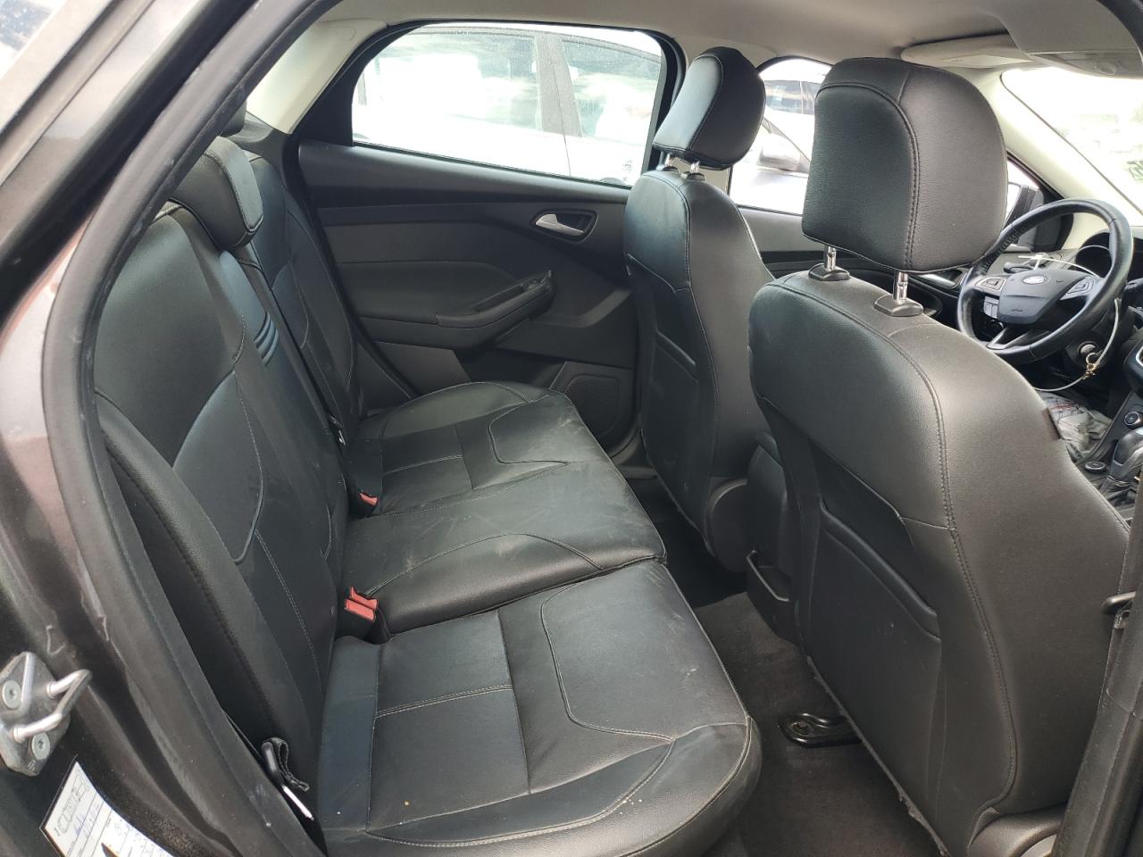 2015 Ford Focus Se VIN: 1FADP3F23FL319123 Lot: 63229995