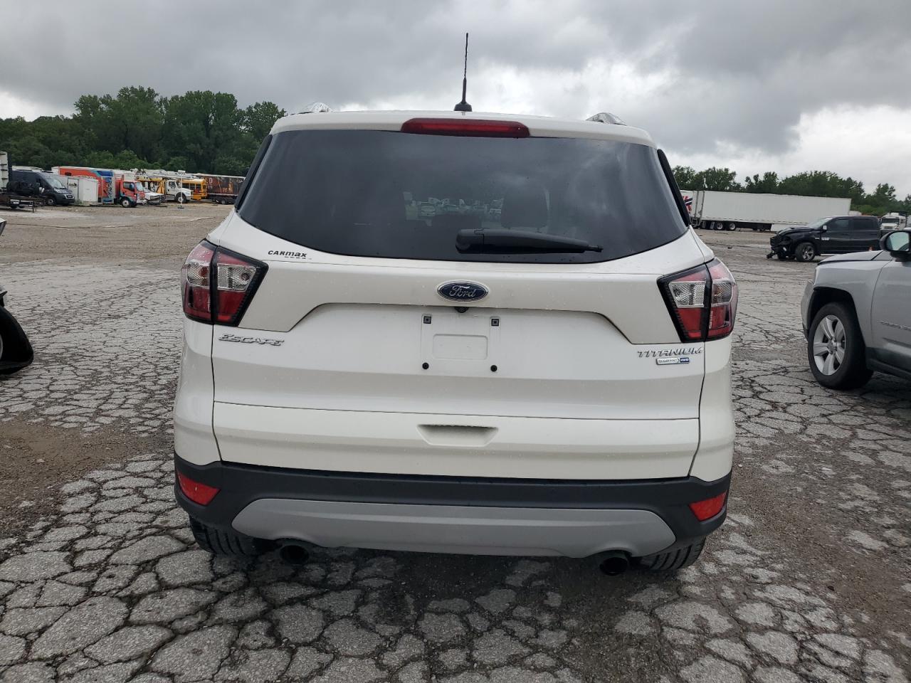 2017 Ford Escape Titanium VIN: 1FMCU9J93HUD32971 Lot: 63750875