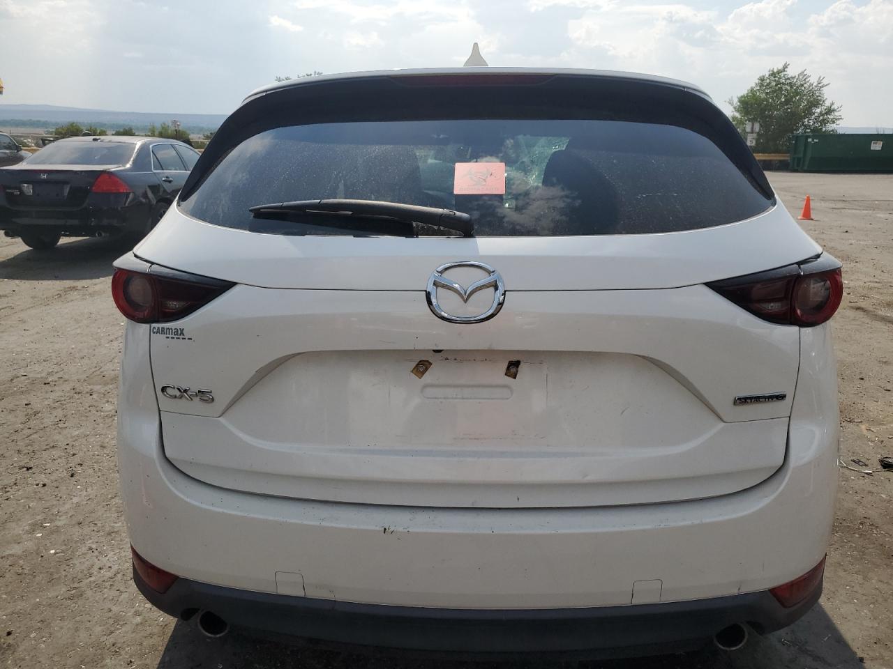 2021 Mazda Cx-5 Touring VIN: JM3KFACMXM1329100 Lot: 63697015