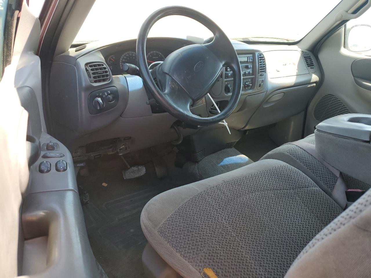 1999 Ford F150 VIN: 1FTRX17L2XKB78998 Lot: 65004535