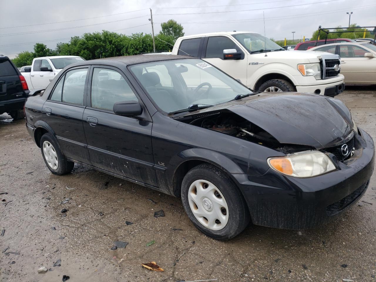 2001 Mazda Protege Dx VIN: JM1BJ222010414736 Lot: 65020415