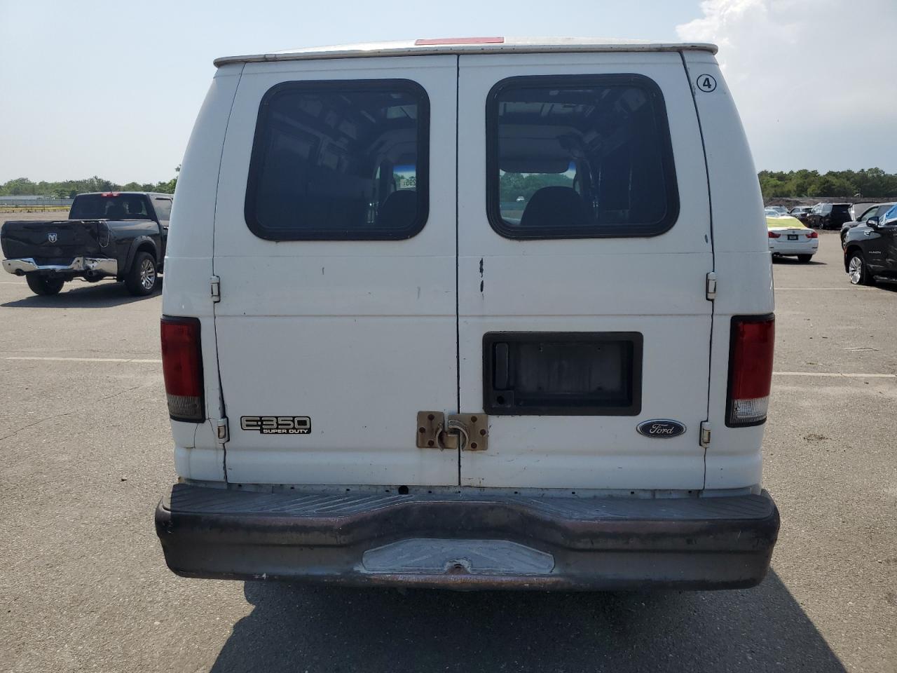 2003 Ford Econoline E350 Super Duty Van VIN: 1FTSE34L13HA38326 Lot: 64162295
