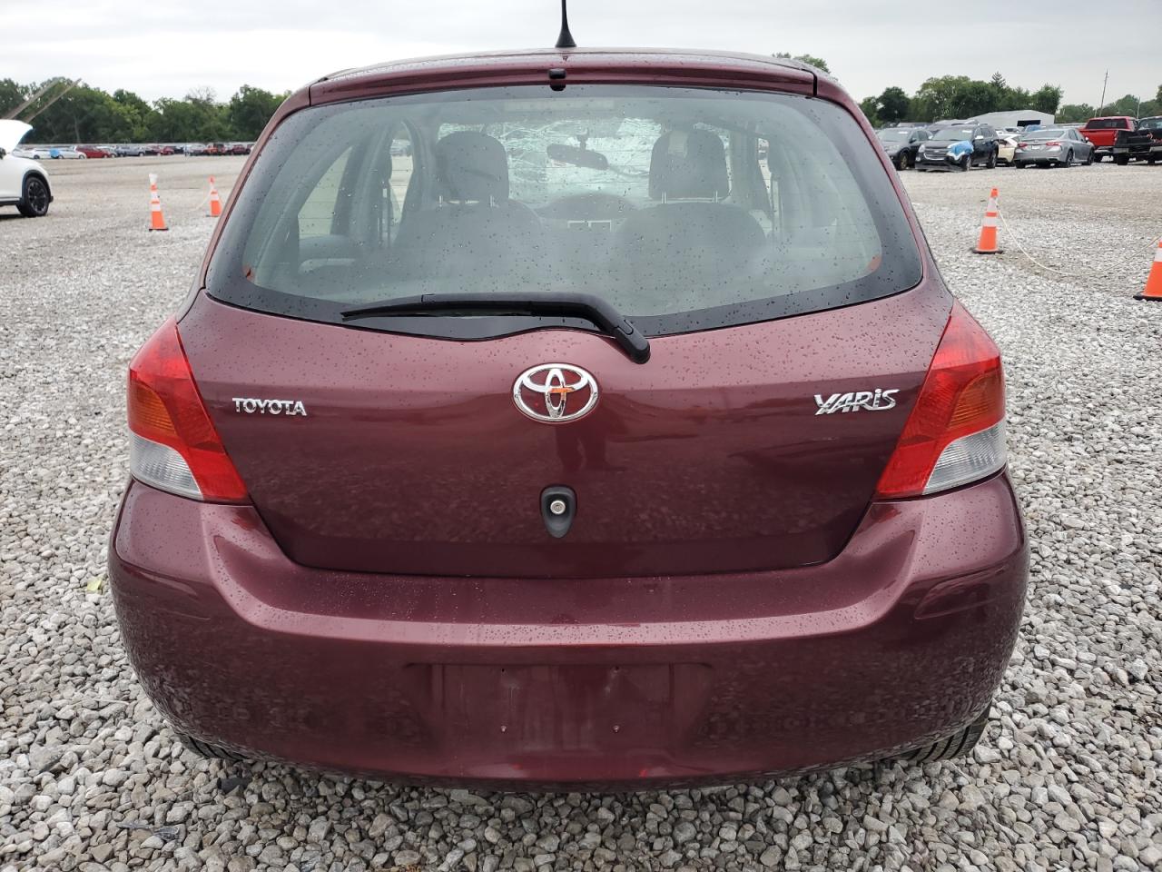 2009 Toyota Yaris VIN: JTDKT903295242464 Lot: 64986825