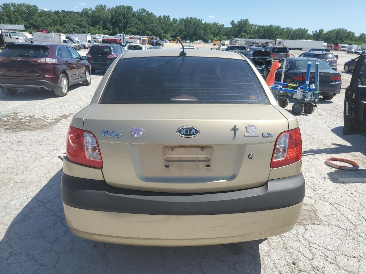 2009 Kia Rio Base VIN: KNADE223796553709 Lot: 63072945