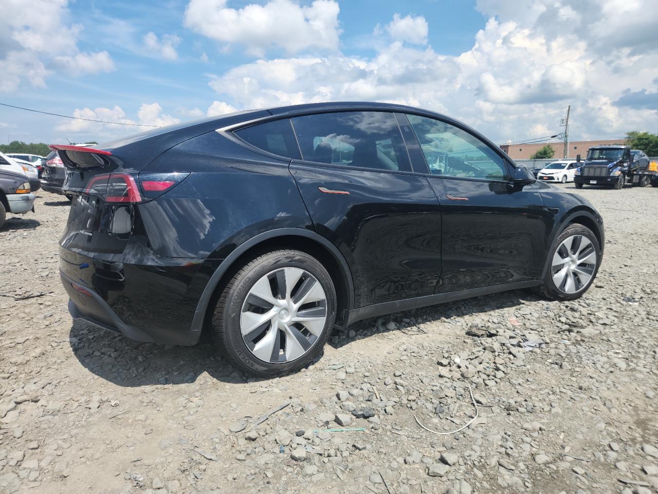 2023 Tesla Model Y VIN: 7SAYGAEE1PF805187 Lot: 64829605