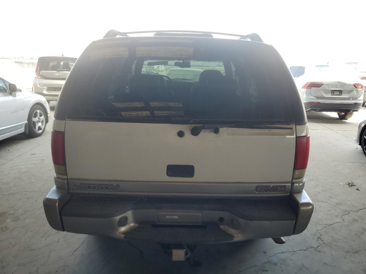 1999 GMC Jimmy VIN: 1GKCS13W5X2510991 Lot: 65163975