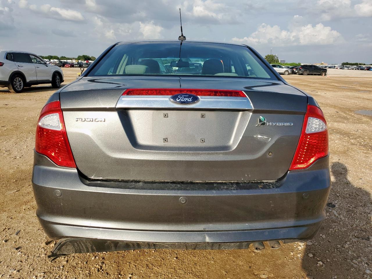 2010 Ford Fusion Hybrid VIN: 3FADP0L34AR147402 Lot: 64518975