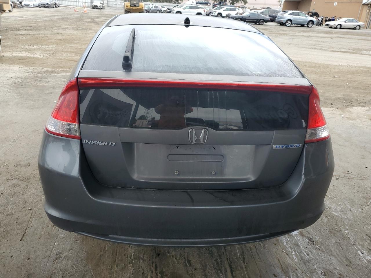 2011 Honda Insight Ex VIN: JHMZE2H77BS006079 Lot: 63873985