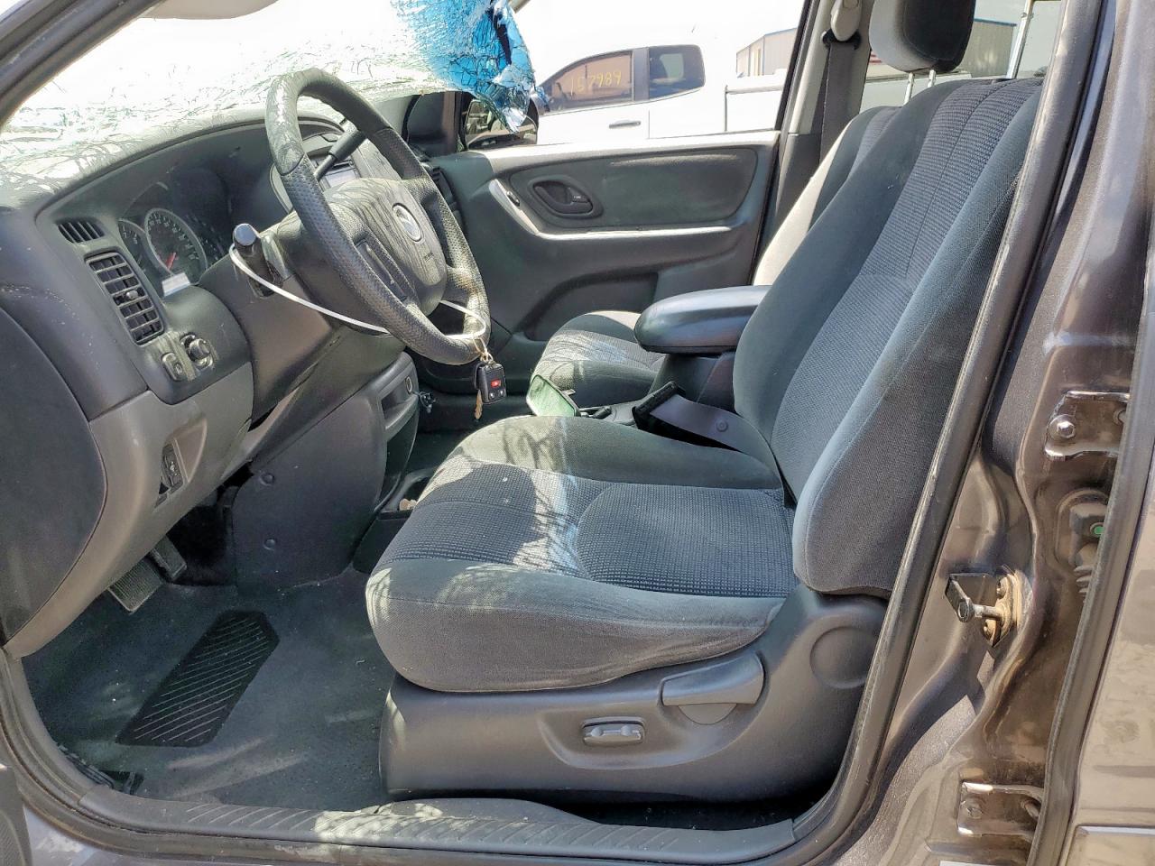 2004 Mazda Tribute Lx VIN: 4F2YZ04184KM02371 Lot: 64953645