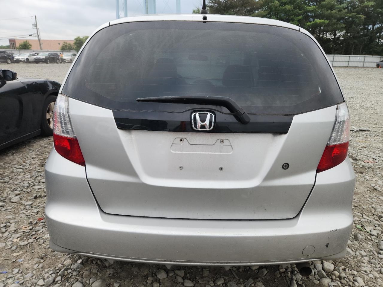 2012 Honda Fit VIN: JHMGE8H35CS003299 Lot: 64742725