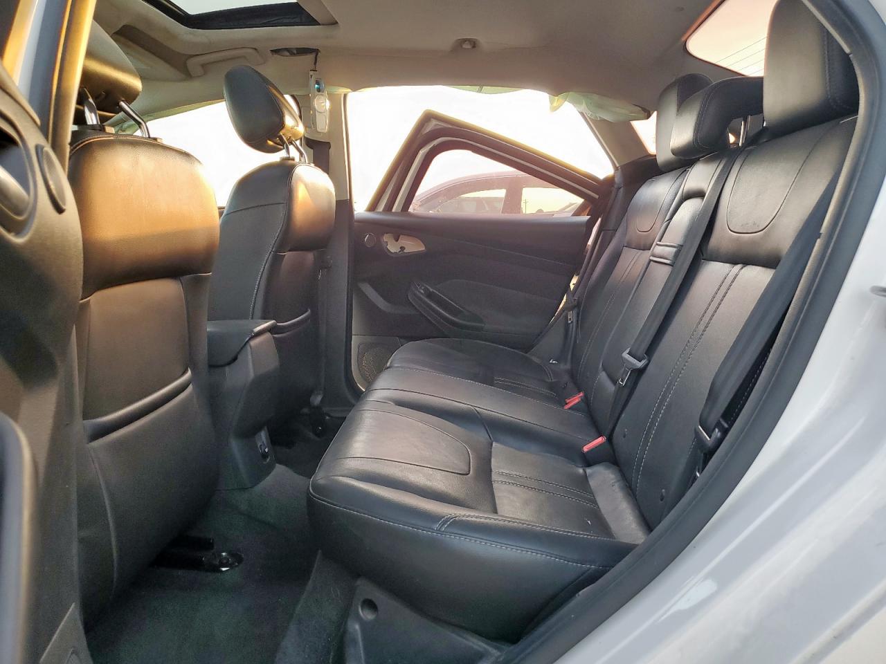 2012 Ford Focus Titanium VIN: 1FAHP3J21CL330464 Lot: 65143735