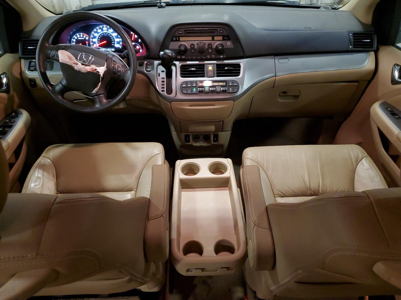 2010 Honda Odyssey Exl VIN: 5FNRL3H60AB021233 Lot: 65763065