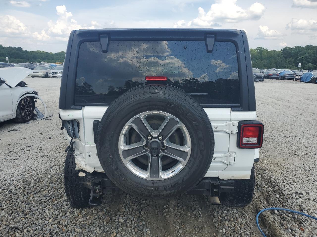 2019 Jeep Wrangler Unlimited Sahara VIN: 1C4HJXEN7KW591781 Lot: 63769795