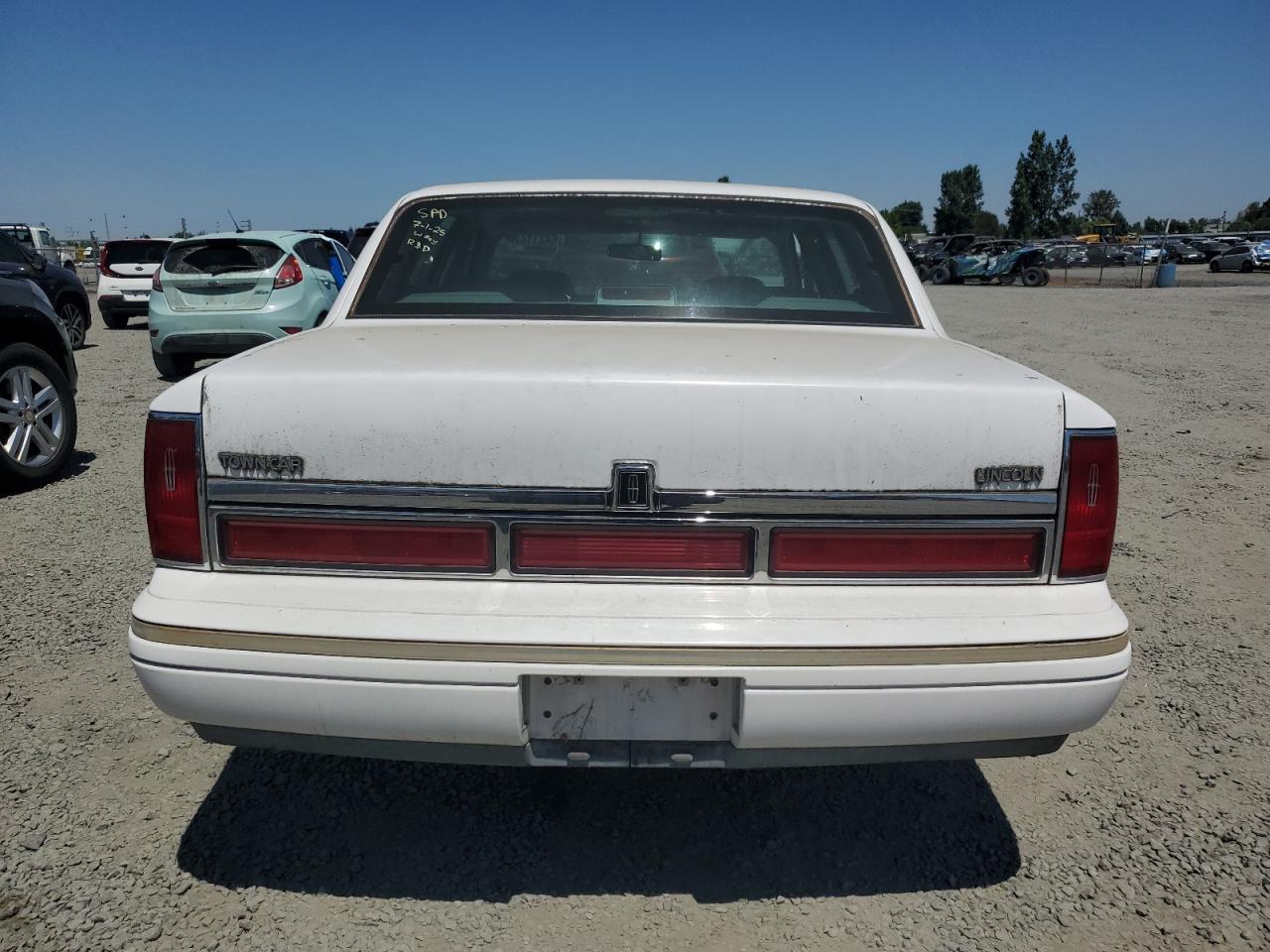 1996 Lincoln Town Car Signature VIN: 1LNLM82W1TY634775 Lot: 64211235