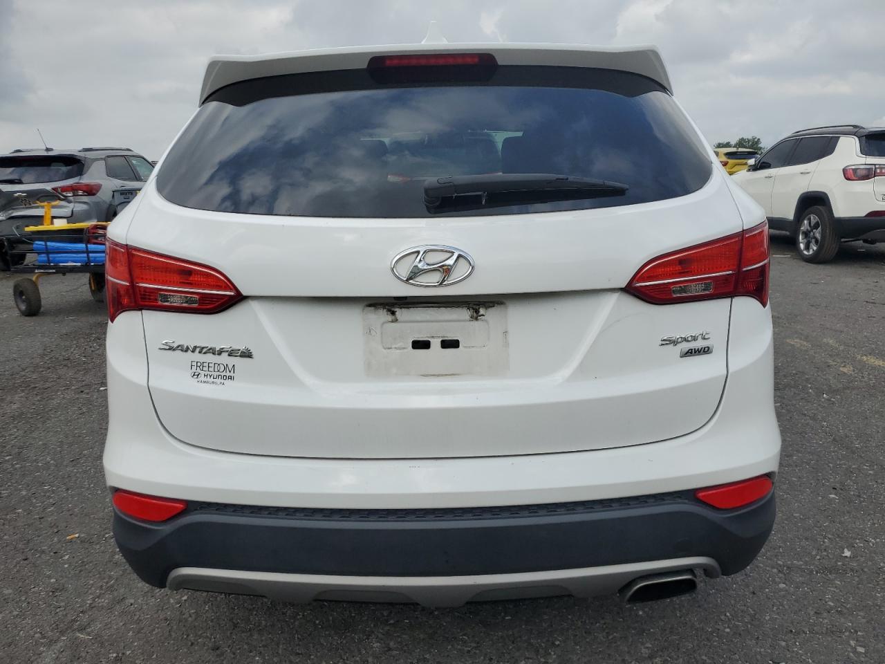 2013 Hyundai Santa Fe Sport VIN: 5XYZUDLB9DG057300 Lot: 64758175