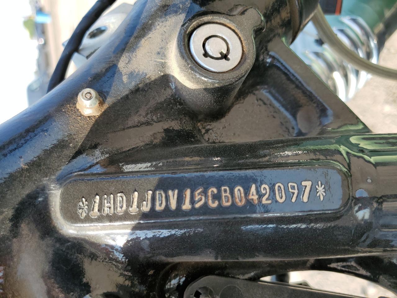 2012 Harley-Davidson Flstn Softail Deluxe VIN: 1HD1JDV15CB042097 Lot: 64658425