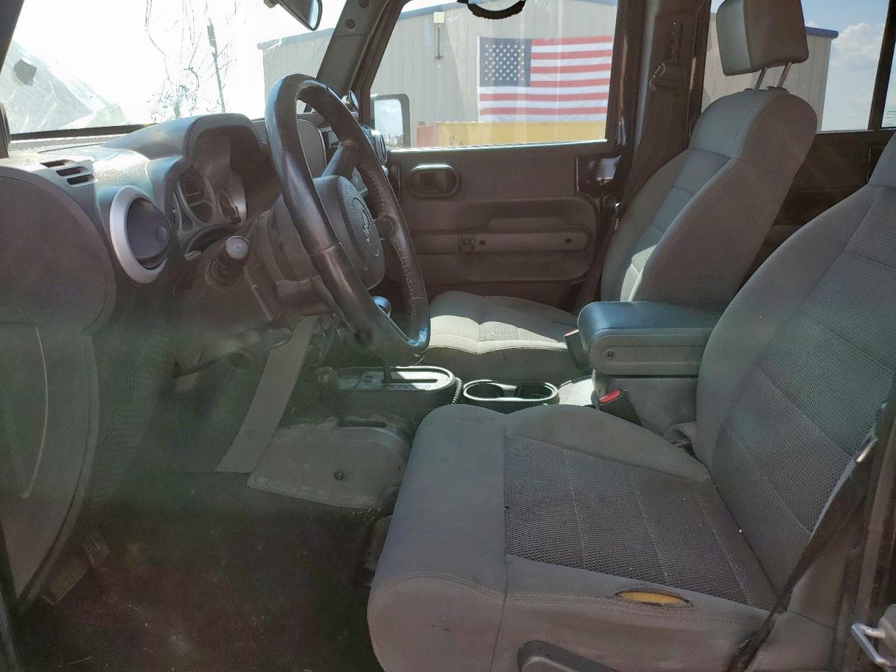 2009 Jeep Wrangler Unlimited Sahara VIN: 1J4GA59119L787129 Lot: 64884105