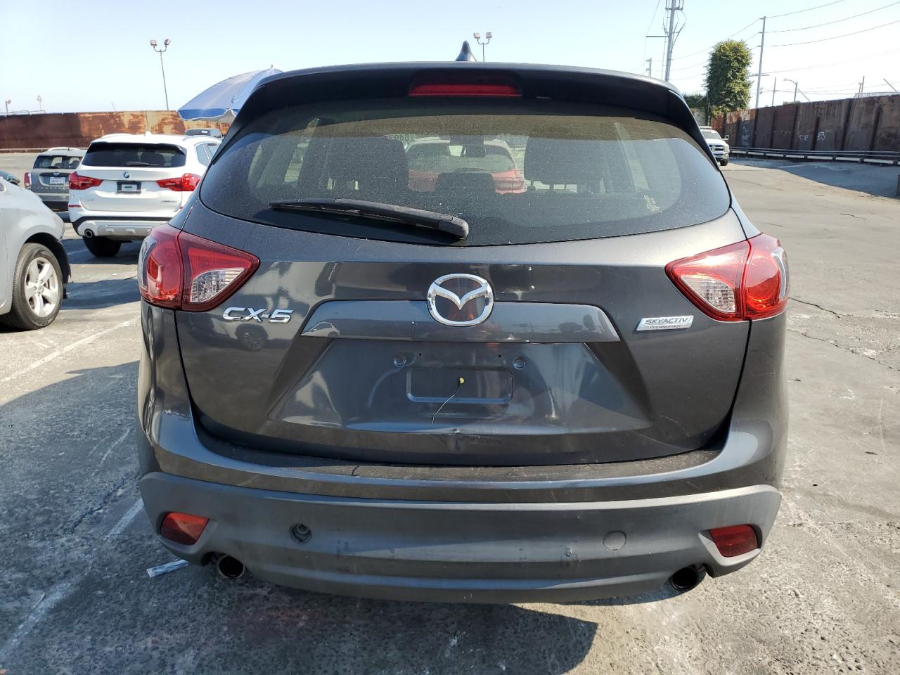 2014 Mazda Cx-5 Sport VIN: JM3KE2BE7E0309090 Lot: 64979815