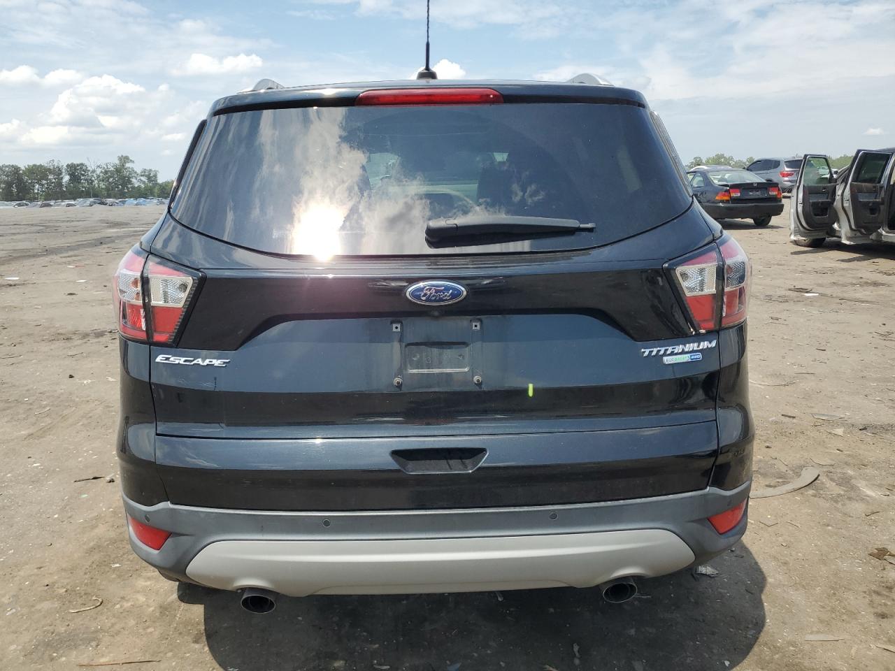 2017 Ford Escape Titanium VIN: 1FMCU9J97HUC82656 Lot: 65087805