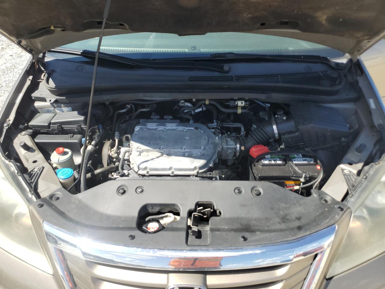 2010 Honda Odyssey Exl VIN: 5FNRL3H61AB001587 Lot: 61915935