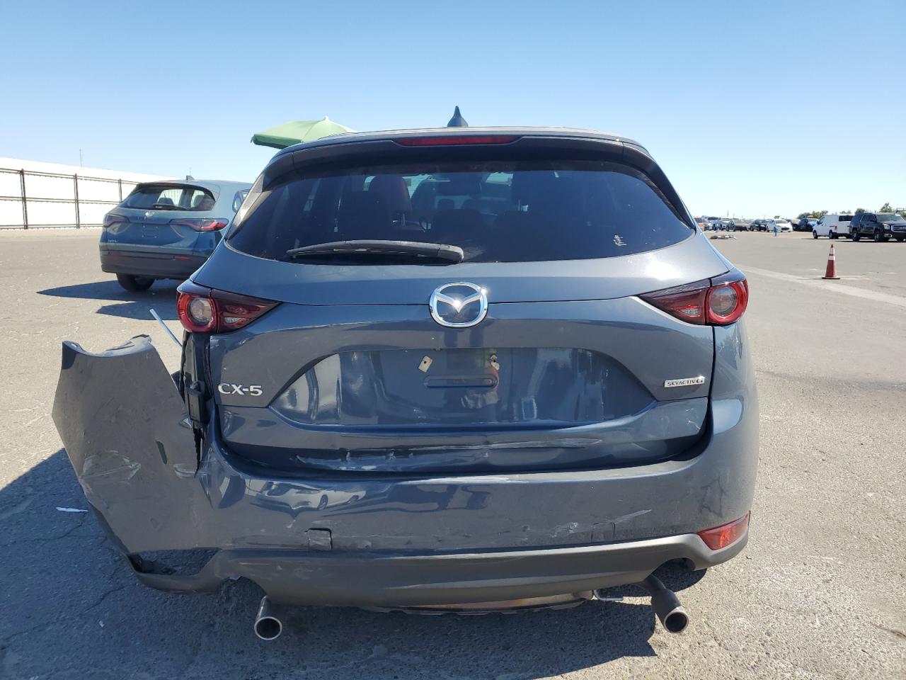 2021 Mazda Cx-5 Touring VIN: JM3KFACM8M0350159 Lot: 64140725