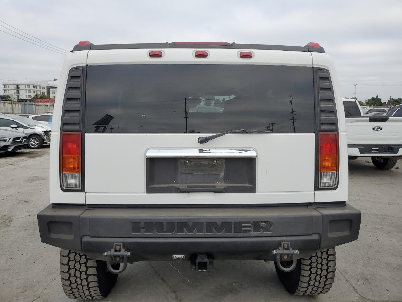 2004 Hummer H2 VIN: 5GRGN23U84H106969 Lot: 65216945