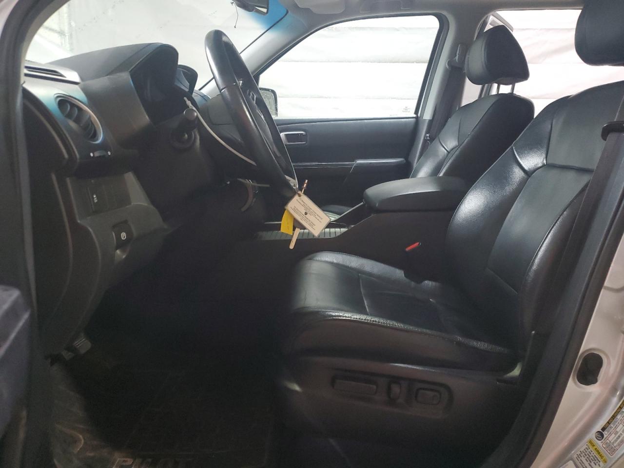 2012 Honda Pilot Exl VIN: 5FNYF3H55CB036596 Lot: 63767015