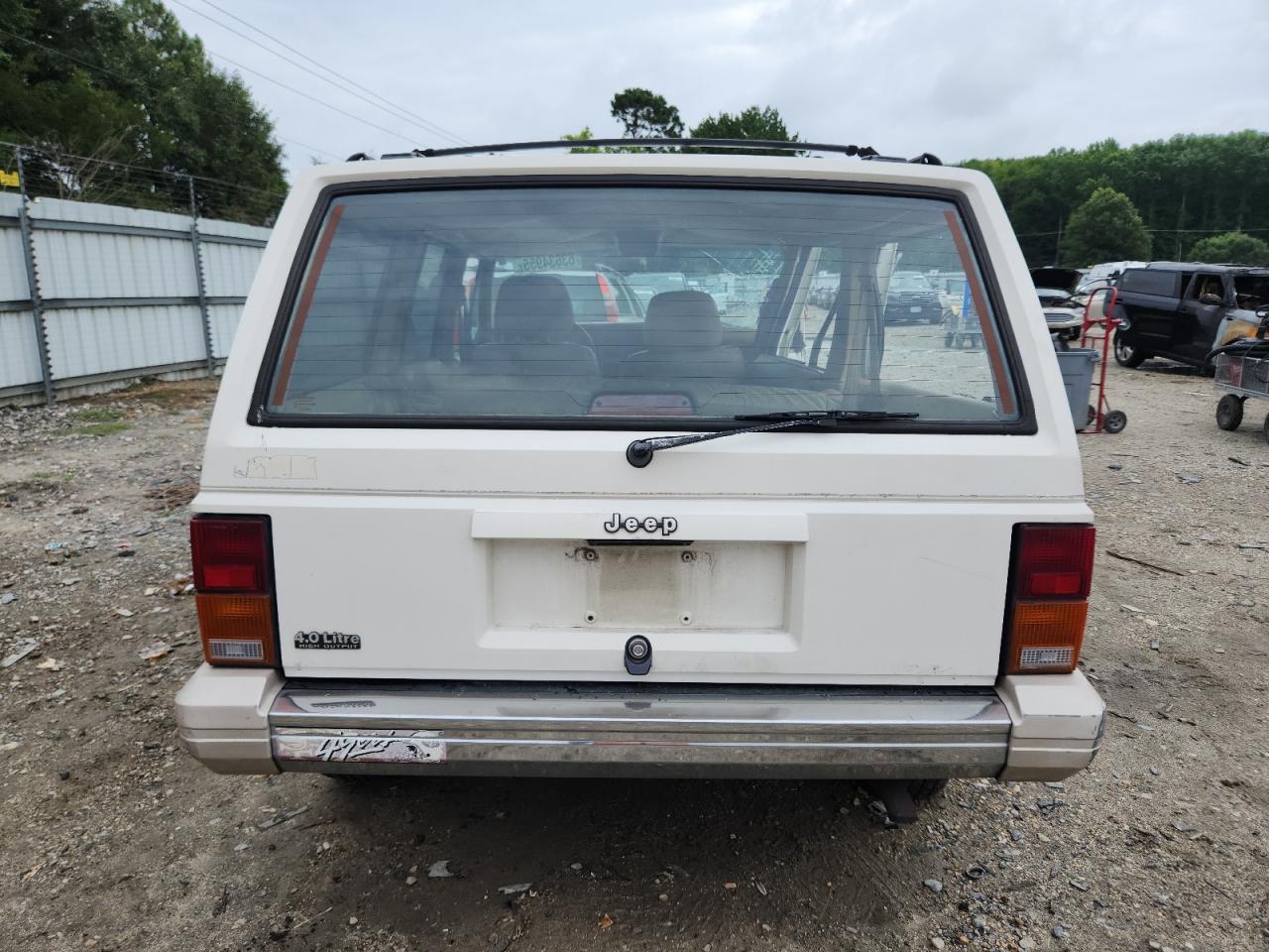 1996 Jeep Cherokee Country VIN: 1J4FT78S3TL311077 Lot: 63634955
