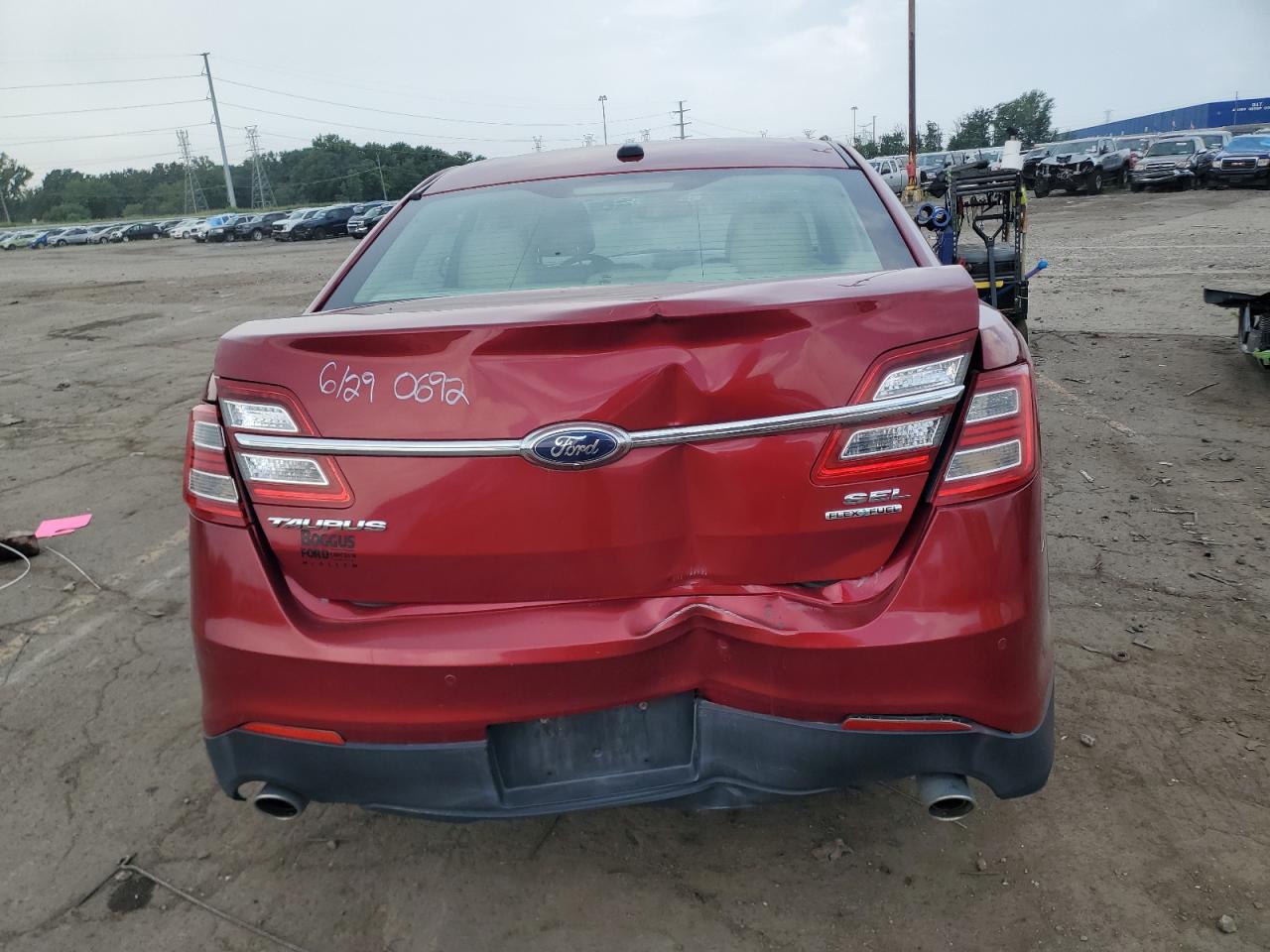 2014 Ford Taurus Sel VIN: 1FAHP2E80EG140692 Lot: 65279625
