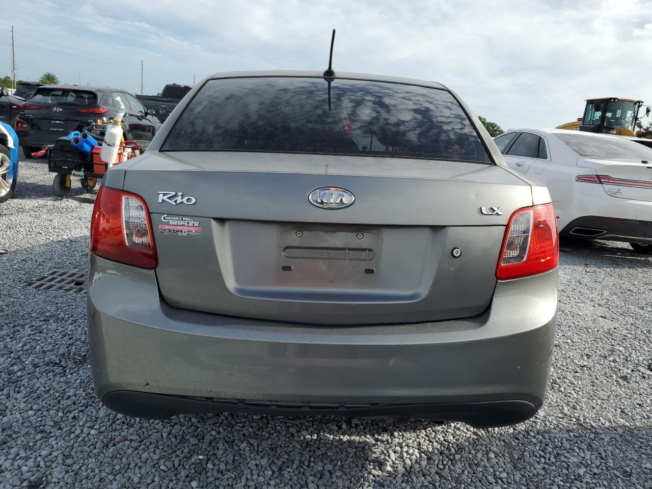 2011 Kia Rio Base VIN: KNADH4A39B6960571 Lot: 65315135