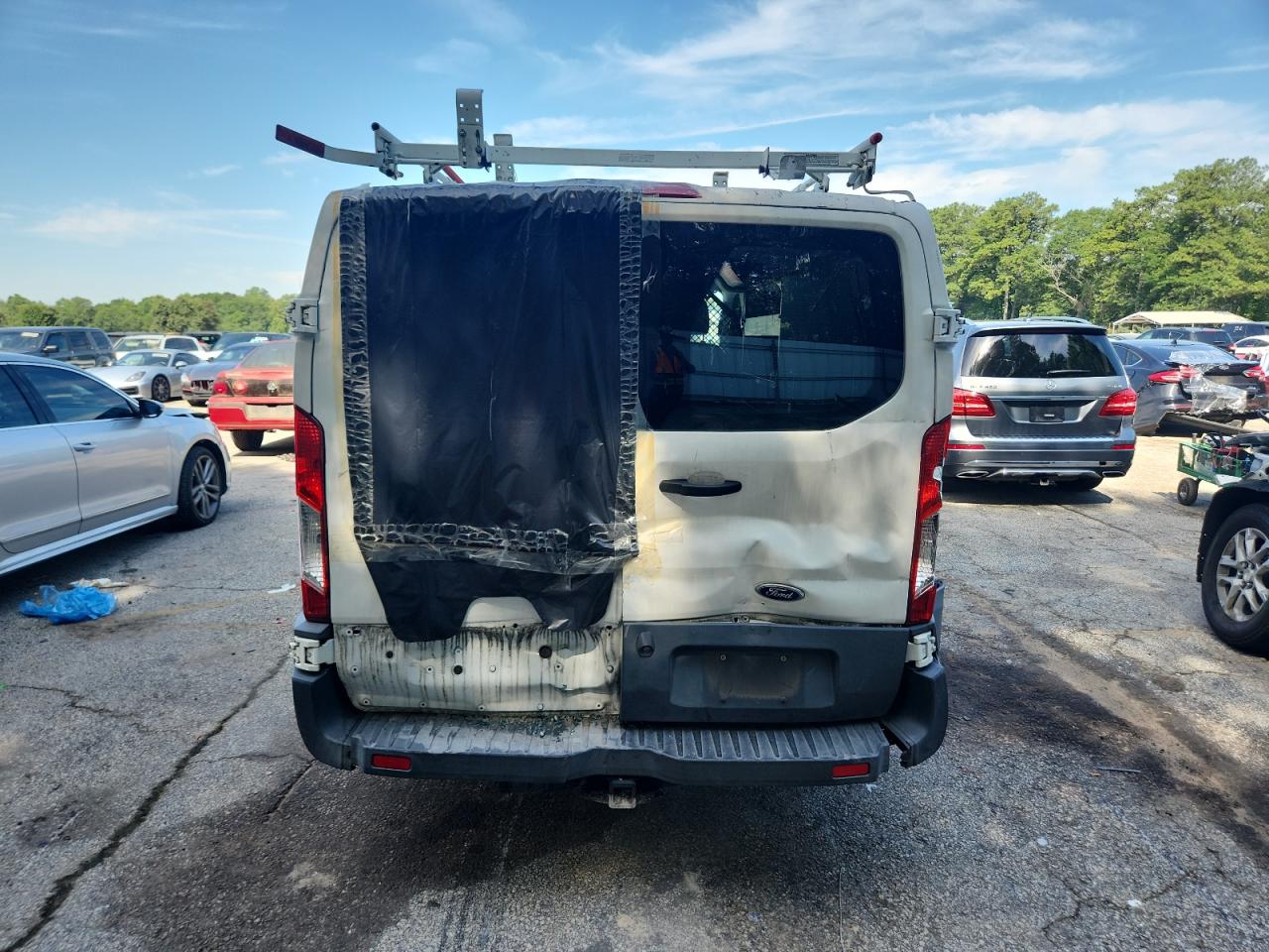 2016 Ford Transit T-150 VIN: 1FTYE1ZMXGKA33683 Lot: 63205115