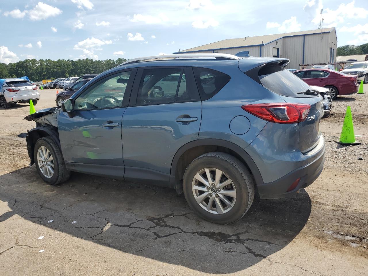 2015 Mazda Cx-5 Touring VIN: JM3KE2CY4F0515171 Lot: 64742415