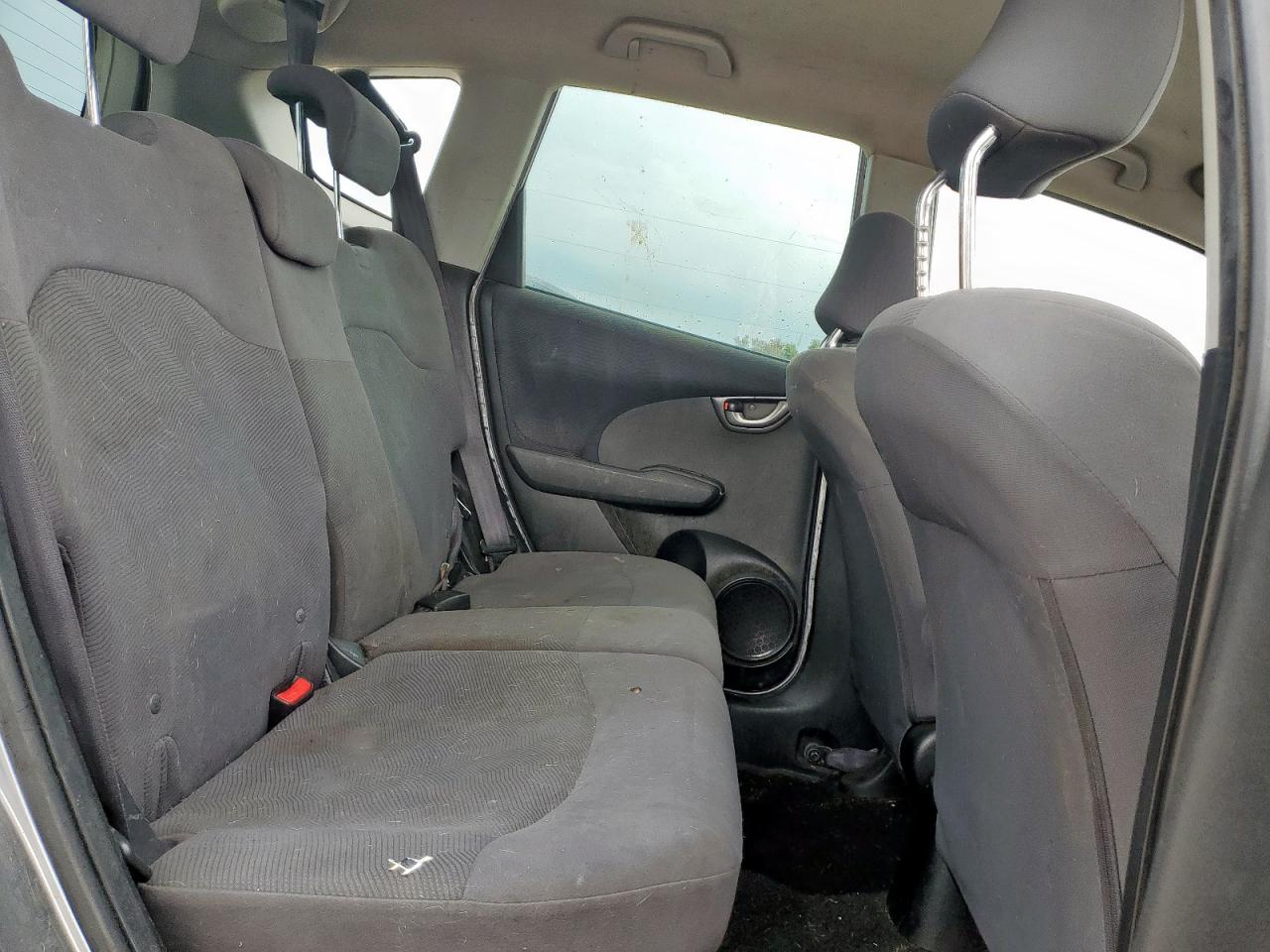 2009 Honda Fit Lx VIN: JHMGE88509S811893 Lot: 63113515