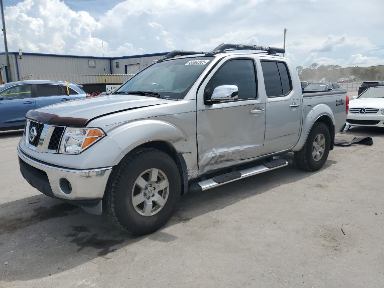 2005 Nissan Frontier Crew Cab Le silver null gas 1N6AD07U75C460616 photo #1