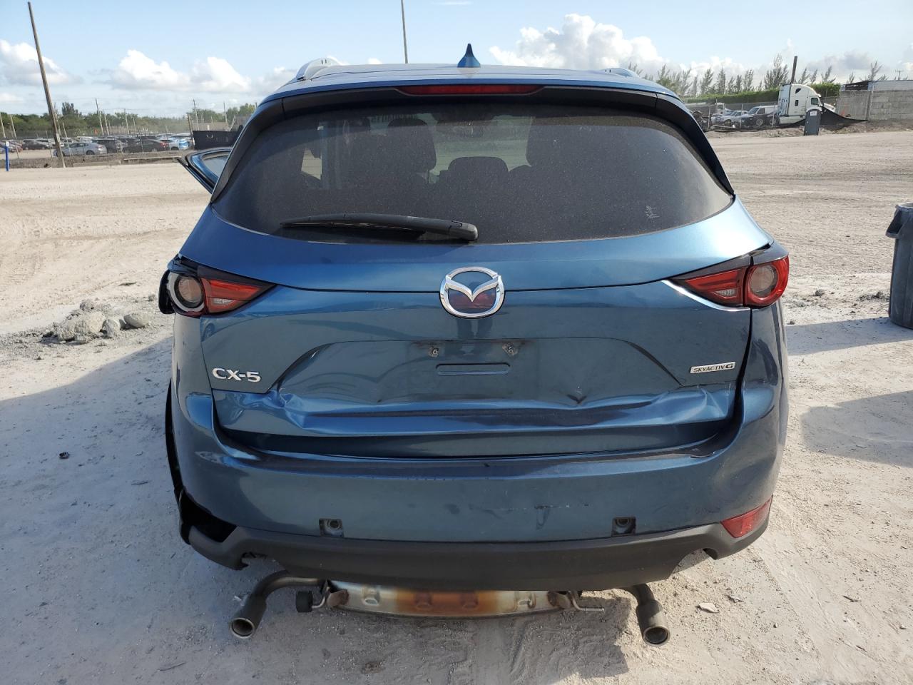 2021 Mazda Cx-5 Grand Touring VIN: JM3KFADM9M0387512 Lot: 64304015