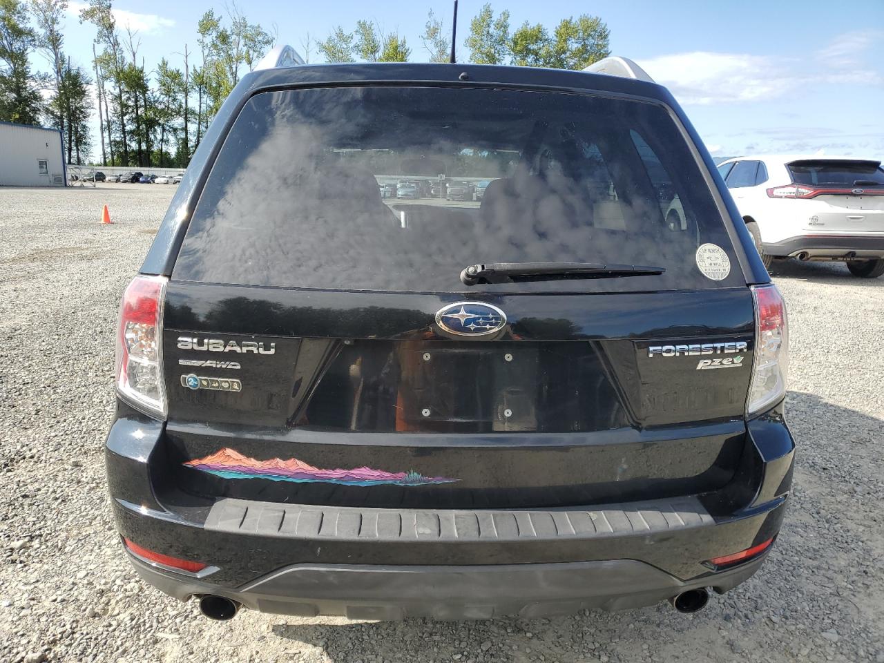 2011 Subaru Forester Touring VIN: JF2SHAHC3BH779258 Lot: 63585345