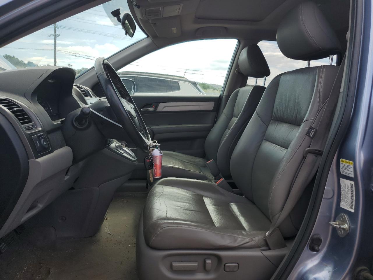 2010 Honda Cr-V Exl VIN: JHLRE4H76AC013064 Lot: 66238275