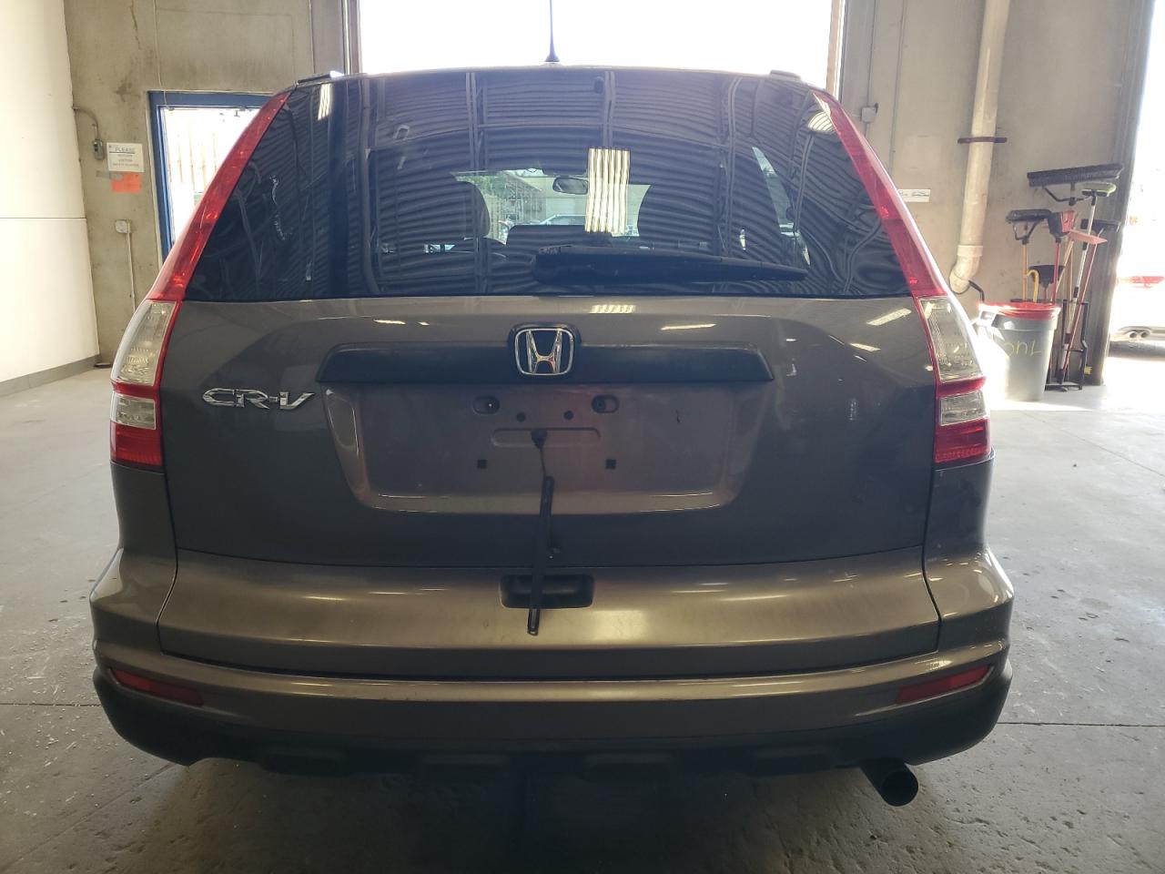 2010 Honda Cr-V Lx VIN: 3CZRE3H31AG704434 Lot: 65079775