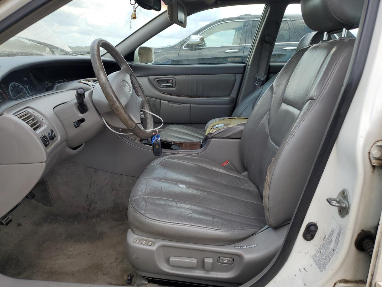 2000 Toyota Avalon Xl VIN: 4T1BF28B2YU003975 Lot: 64704365