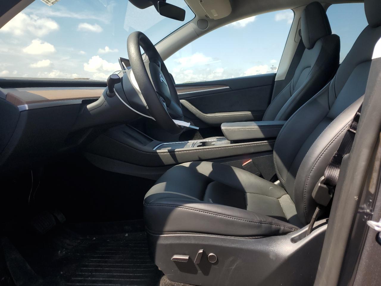 2023 Tesla Model Y VIN: 7SAYGDEEXPF890418 Lot: 64557175