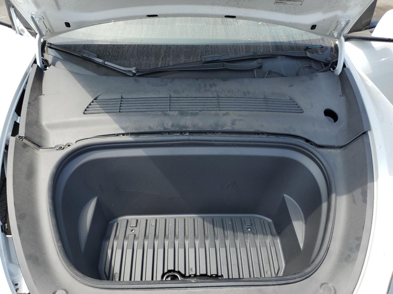 2023 Tesla Model Y VIN: 7SAYGAEE9PF599715 Lot: 65394255