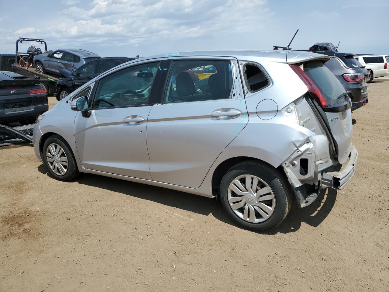 2015 Honda Fit Lx VIN: 3HGGK5H59FM709104 Lot: 63569065