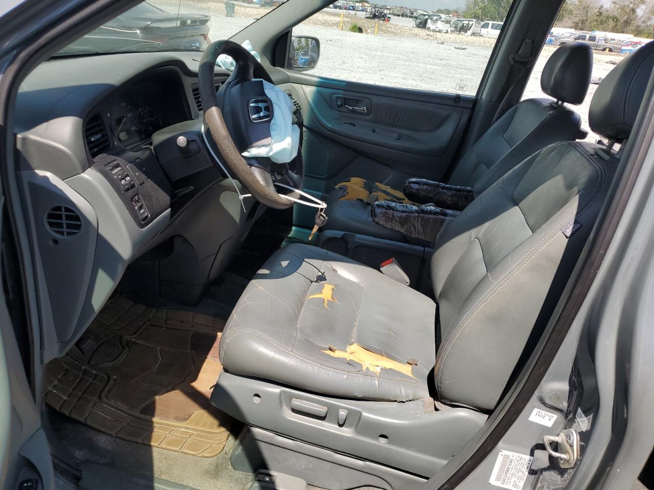 2002 Honda Odyssey Exl VIN: 2HKRL18962H552809 Lot: 63631115