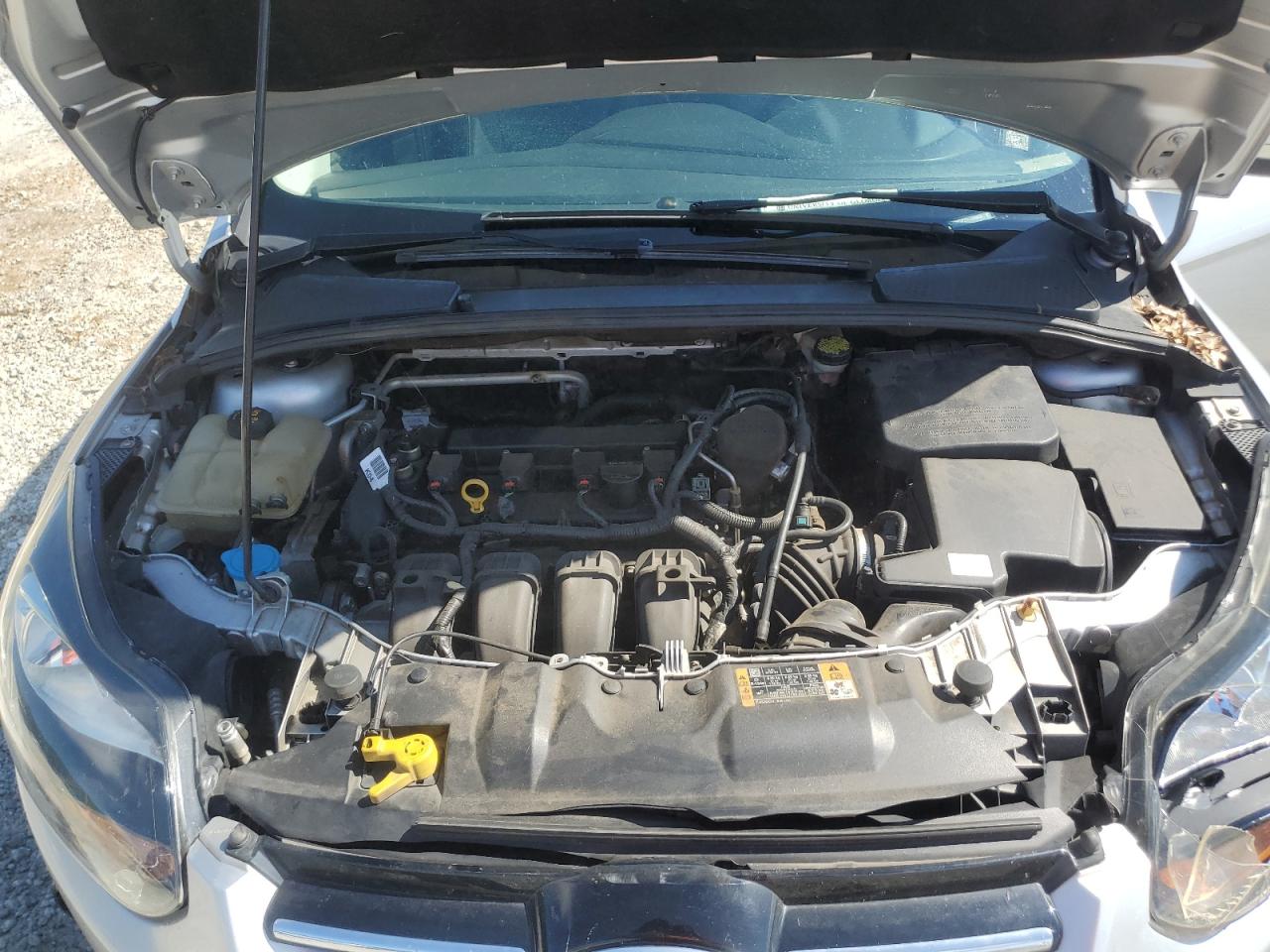2014 Ford Focus Titanium VIN: 1FADP3N27EL409889 Lot: 63164225