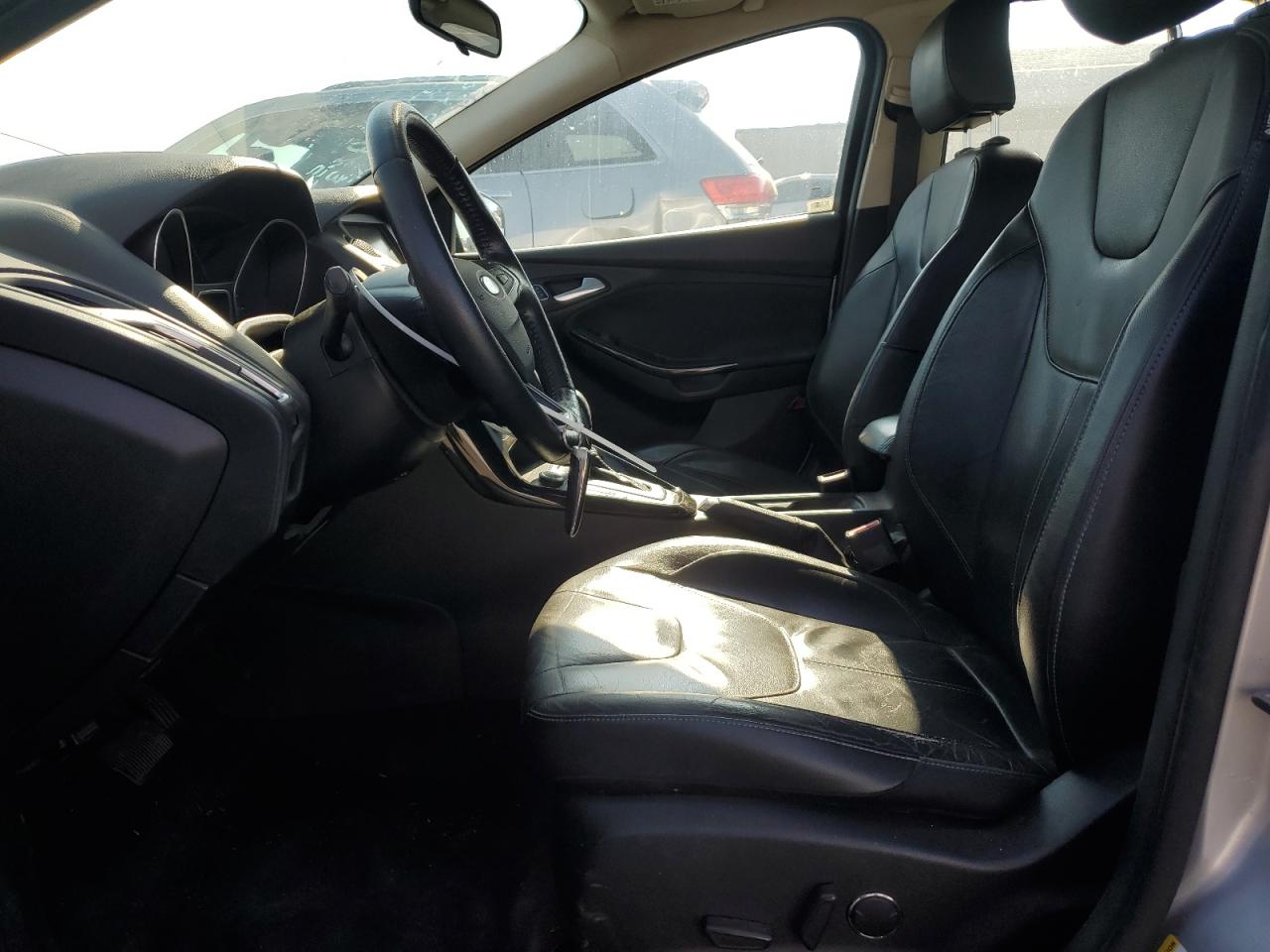 2015 Ford Focus Titanium VIN: 1FADP3J29FL269772 Lot: 63290225