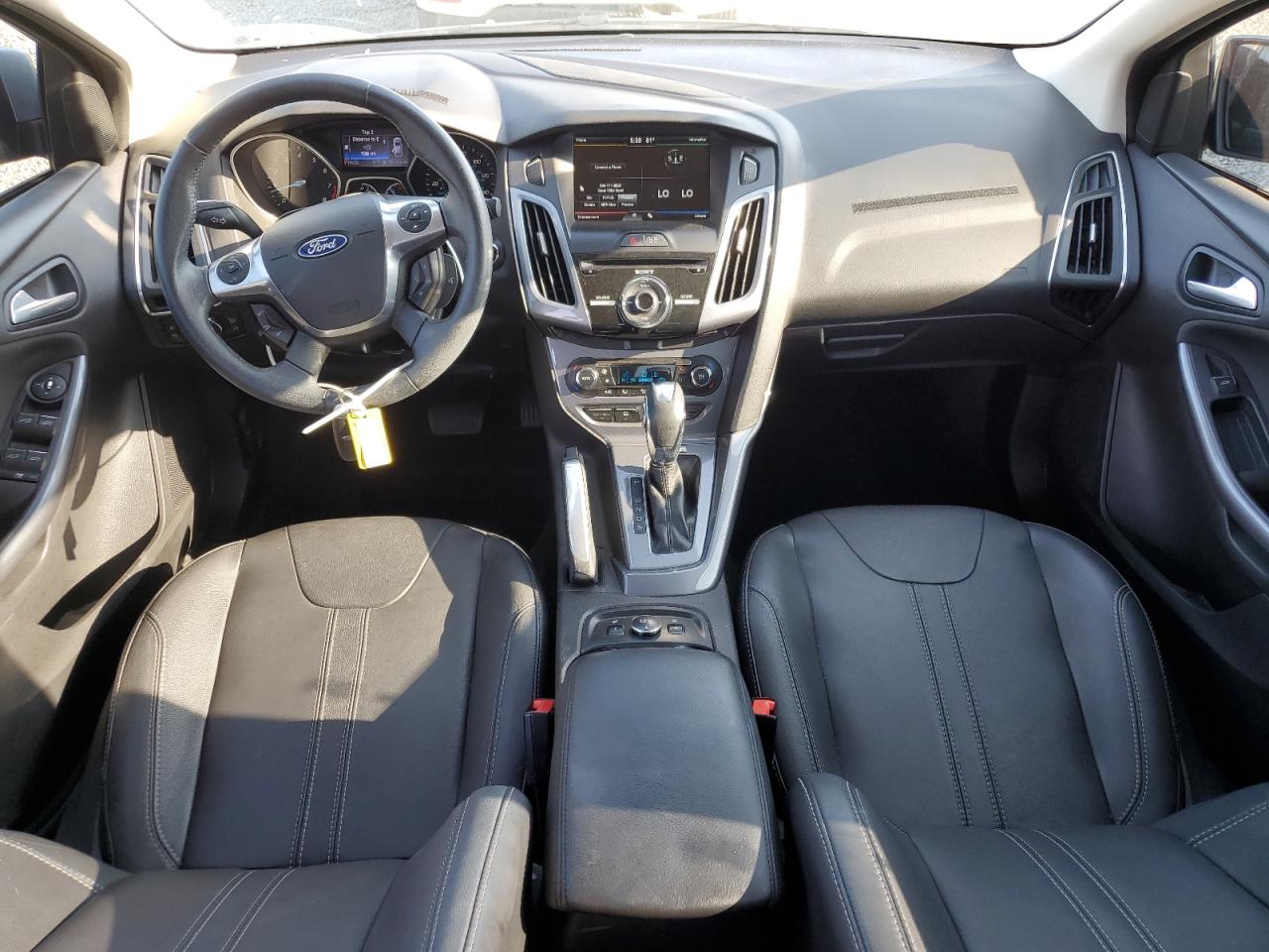 2013 Ford Focus Titanium VIN: 1FADP3J24DL116892 Lot: 65040065