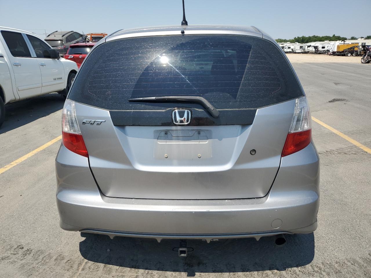 2010 Honda Fit VIN: JHMGE8H22AC006658 Lot: 65024125
