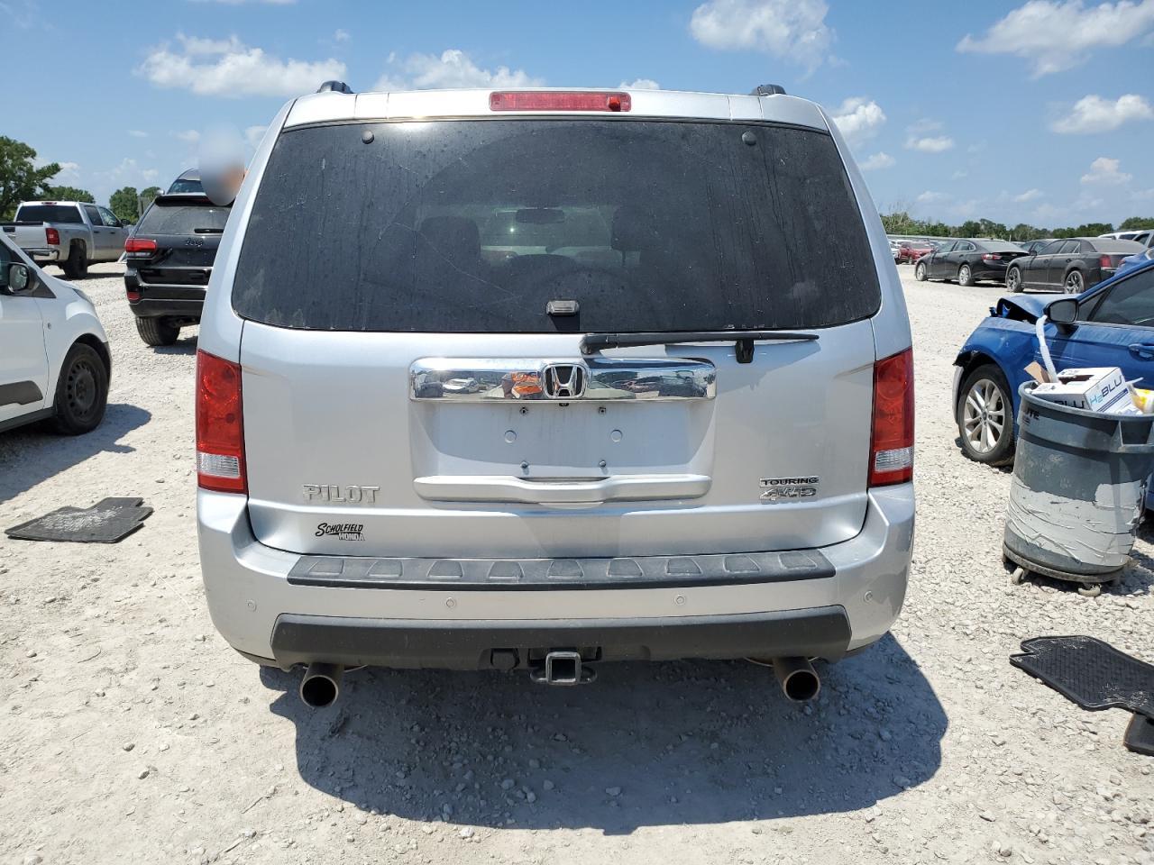 2011 Honda Pilot Touring VIN: 5FNYF4H95BB056709 Lot: 63126095