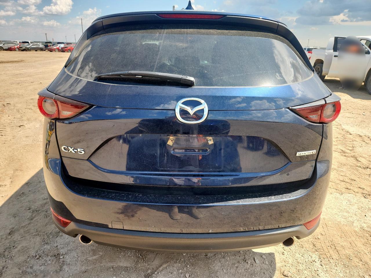 2021 Mazda Cx-5 Touring VIN: JM3KFACM6M1311807 Lot: 62475225