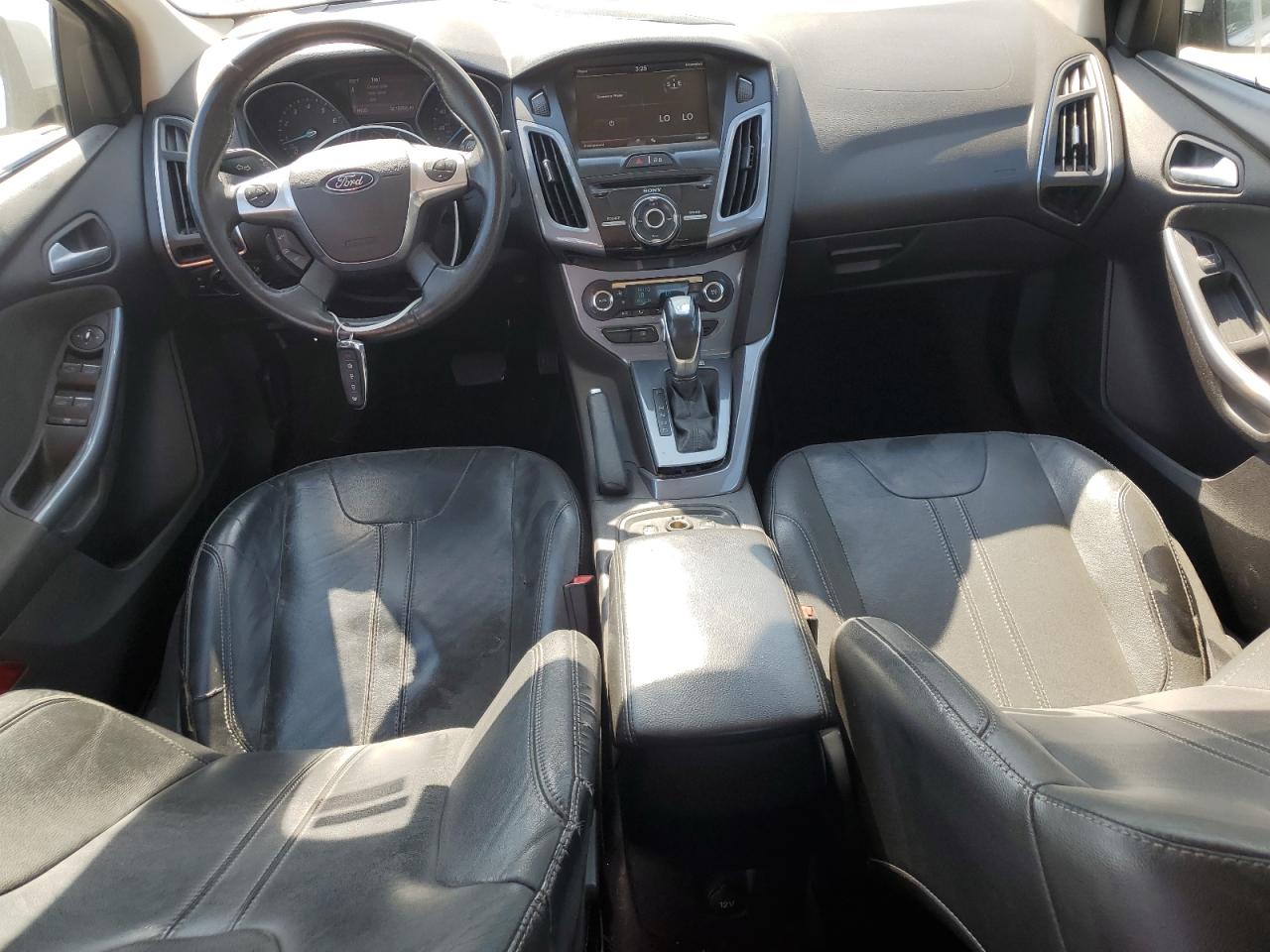 2014 Ford Focus Titanium VIN: 1FADP3J28EL179267 Lot: 65359335